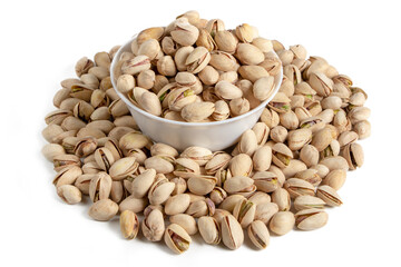 White bowl of pistachios on white background