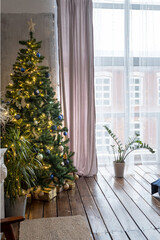Beautiful decorated Christmas tree with fairy lights in a living room. Interior design.