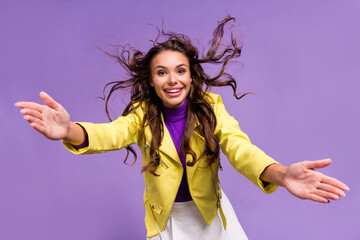 Photo of young cheerful lady open arms hospitable cuddle casual clothes isolated over violet color background