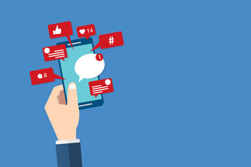 Social Media Smart Phone, Viral content, social media marketing and social media activity - likes, shares and comments popping up on the mobile screen