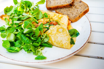 French Omelette with Potatoes, Mushroom and Salad