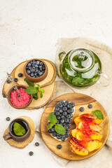 Tasty toast bread with cream cheese and ripe fruits