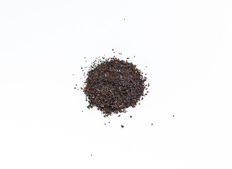 Black tea on a white background. Tea leaves. High quality photo