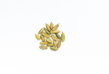 handful of cardamom on white background. High quality photo