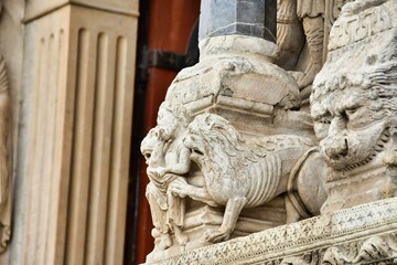 sculpture of lion, photo as a background , in arles, provence, france