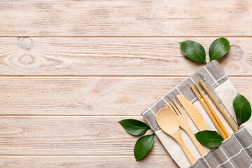 Eco friendly reusable recyclable white eco bag with kitchenware on Colored background. Concept zero waste