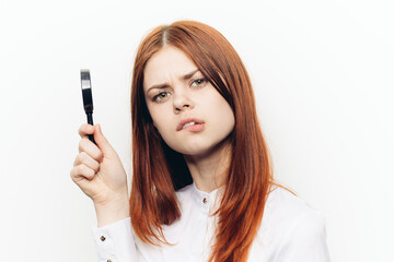 cheerful woman in white shirt pump in hands search tool