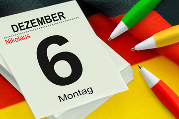Kalender Nikolaus 6. Dezember 2021 Deutsche Flagge und Kugelschreiber rot grün gelb