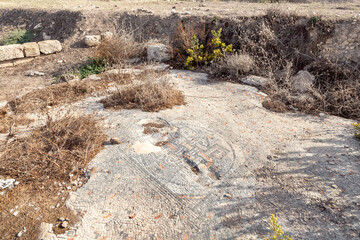 Remains  of an ancient mosaic of a 6th-century Orthodox church at Tel Shikmona, on the shores of...