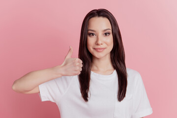 Photo of young attractive girl good mood show thumb-up fine approve quality isolated over pink color background