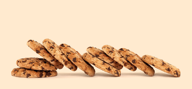 Cookie Day banner with a lot of delicious chocolate chip cookies on a creamy color background