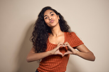 Beautiful woman showing heard shape