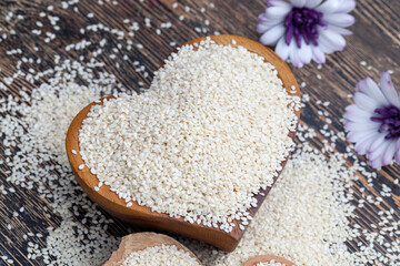 white sesame seeds on a wooden table