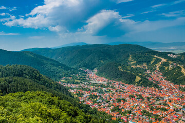 city Brasov in mountains aerial view, Romania