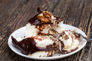chocolate cream cake covered with milk chocolate