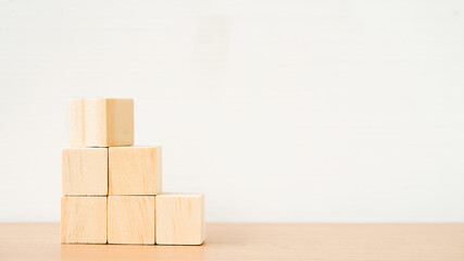 blank flipped square wooden cube on top of stack for create icon symbol to success, goal or target concept