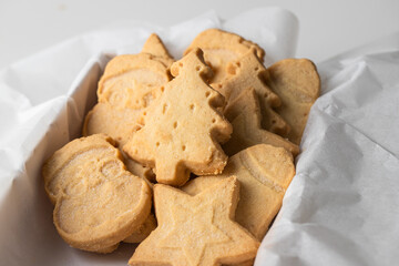 Festive shape shortbread cookies. Famous Scottish  biscuits into the white box.