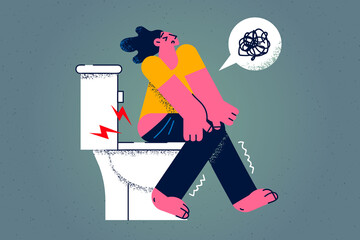 Unhealthy woman sit on toilet struggle with constipation  - obrazy, fototapety, plakaty
