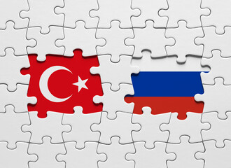 Jigsaw puzzle with the national flags of Turkey and Russia. International conflict or partnership