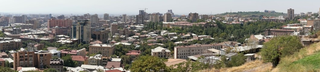Fototapeta na wymiar Armenia, Yerevan, September 2021. Panorama of the capital taken from the stairs of the Grand Cascade.