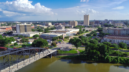 Top view downtown Waco and Cultural District from Washington Avenue Bridge cross Brazos River - obrazy, fototapety, plakaty