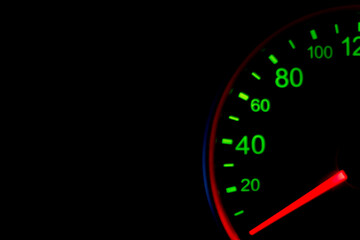 speedometer on car dashboard