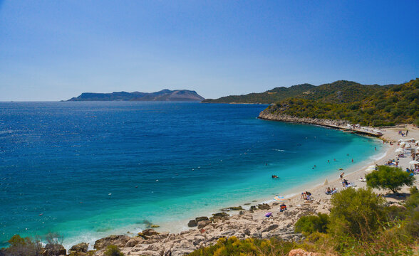 Kas Bilediesi public beach with crystal clear turquose sea water. Antalya, Turkey,