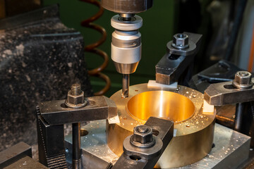 The boring operation the brass part with NC milling machine.