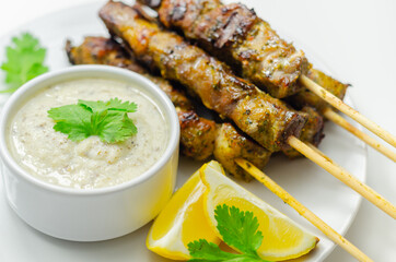 Pork shoulder kebabs with a lemon and herb rub and a garlic and mint yogurt sauce
