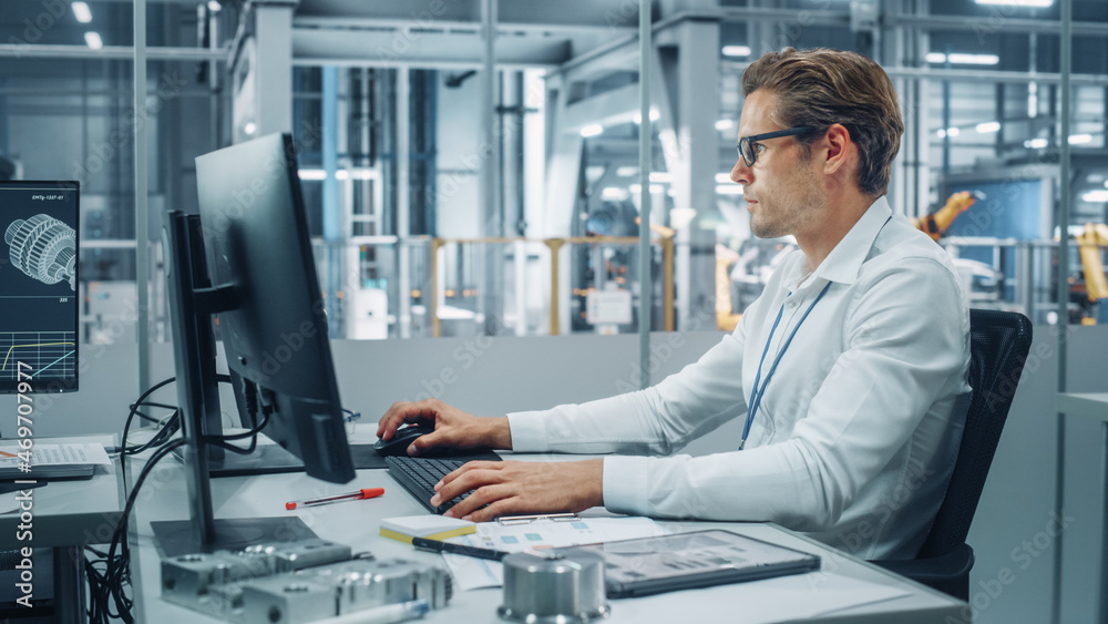 Poster Handsome Automotive Engineer Working on Desktop Computer in Modern Office at Car Assembly Plant. Industrial Project Manager Developing Sales, Finance and Marketing Reports at Vehicle Factory.