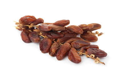 Sweet dates on branches against white background. Dried fruit as healthy snack