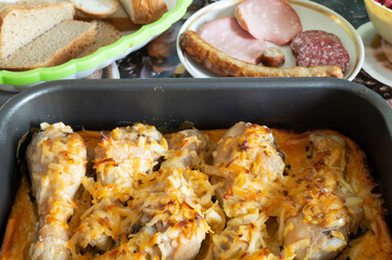 Chicken meat in milt with egg and spice on pan.