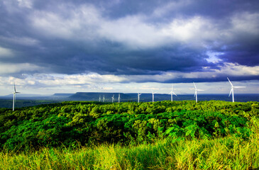 Large wind turbines for generating electricity are lined up on Khao Yai Thiang, Nakhon Ratchasima Province, Thailand.