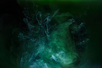 Green smoke on black ink background, colorful fog, abstract swirling emerald ocean sea, acrylic...