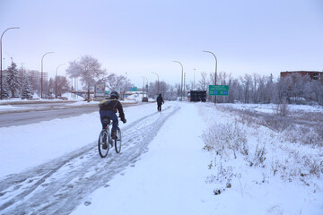 Cycling in a Snow Day. Winter Season in Winnipeg, Canada.
