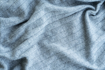 Obraz na płótnie Canvas Gray wool knitted sweater texture. Flat style.