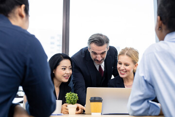 Business people discussing with ideas at meeting.
