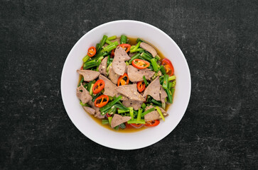 Stir fried onion flower stem with pork liver