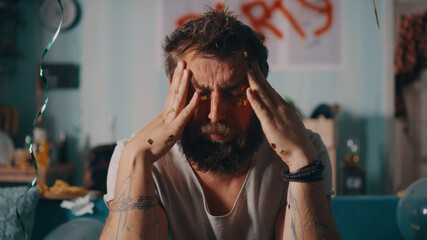 Drunk man suffering from hangover