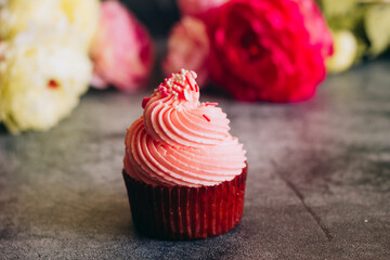 Delicious cupcakes. Cupcakes on a concrete table