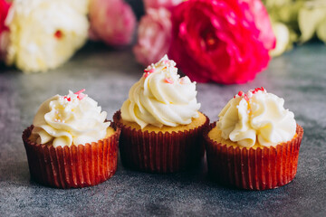 Delicious cupcakes. Cupcakes on a concrete table