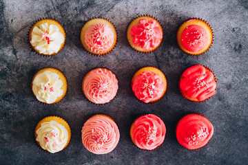 Delicious cupcakes. Cupcakes on a concrete table