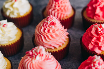 Delicious cupcakes. Cupcakes on a concrete table