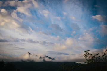 Morning dramatic cloudscape sky on a mountain peak landscape