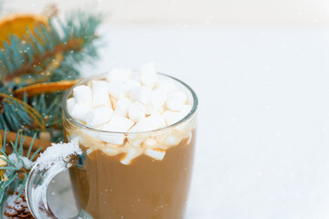 christmas composition cocoa glass glass with marshmallow side garlands snow fir branches
