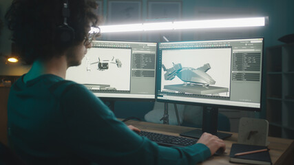 Male freelancer rendering 3D model of aircraft