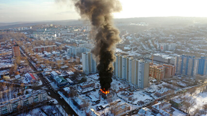 Fire in the house. An apartment building in Irkutsk is on fire. A flame of fire engulfed the...