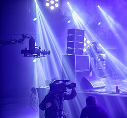 television camera. camera in a concert hall