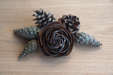 Christmas decor with  conifer, cedar, pine cones, on wooden   background