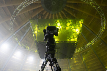 television camera. camera in a concert hall